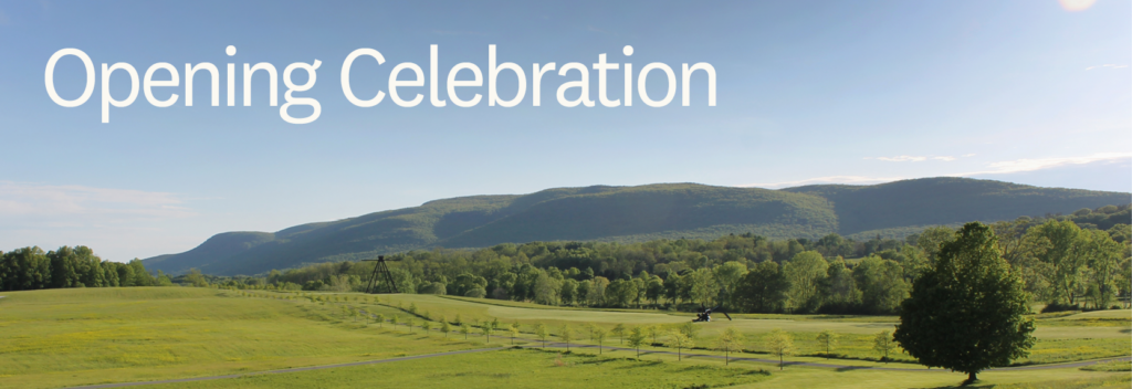 Opening Celebration overlayed on a landscape with clear blue sky, sprawling mountains, and bright green trees framing a grassy field