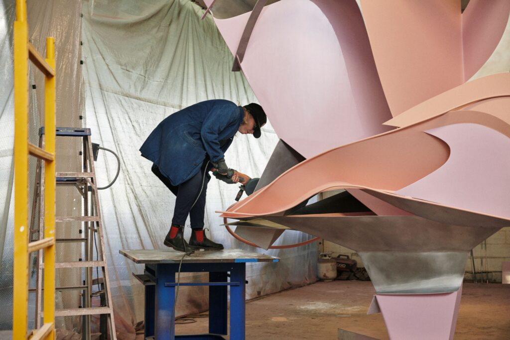 Arlene Shechet in the fabrication shop with a new outdoor commission for Storm King Art Center