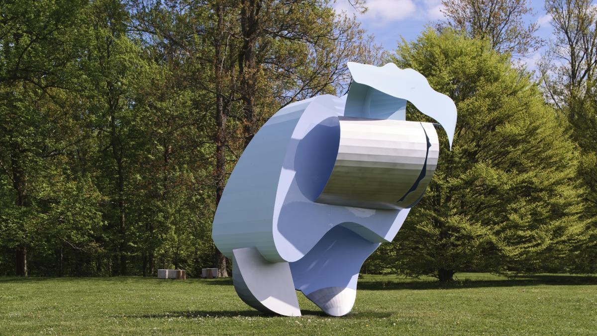 This large aluminum sculpture shifts in color from shiny robin’s-egg blue to sleek sky blue with accents of raw aluminum. The rounded planes have visible bump breaks, appearing to have been folded and unfolded like paper.