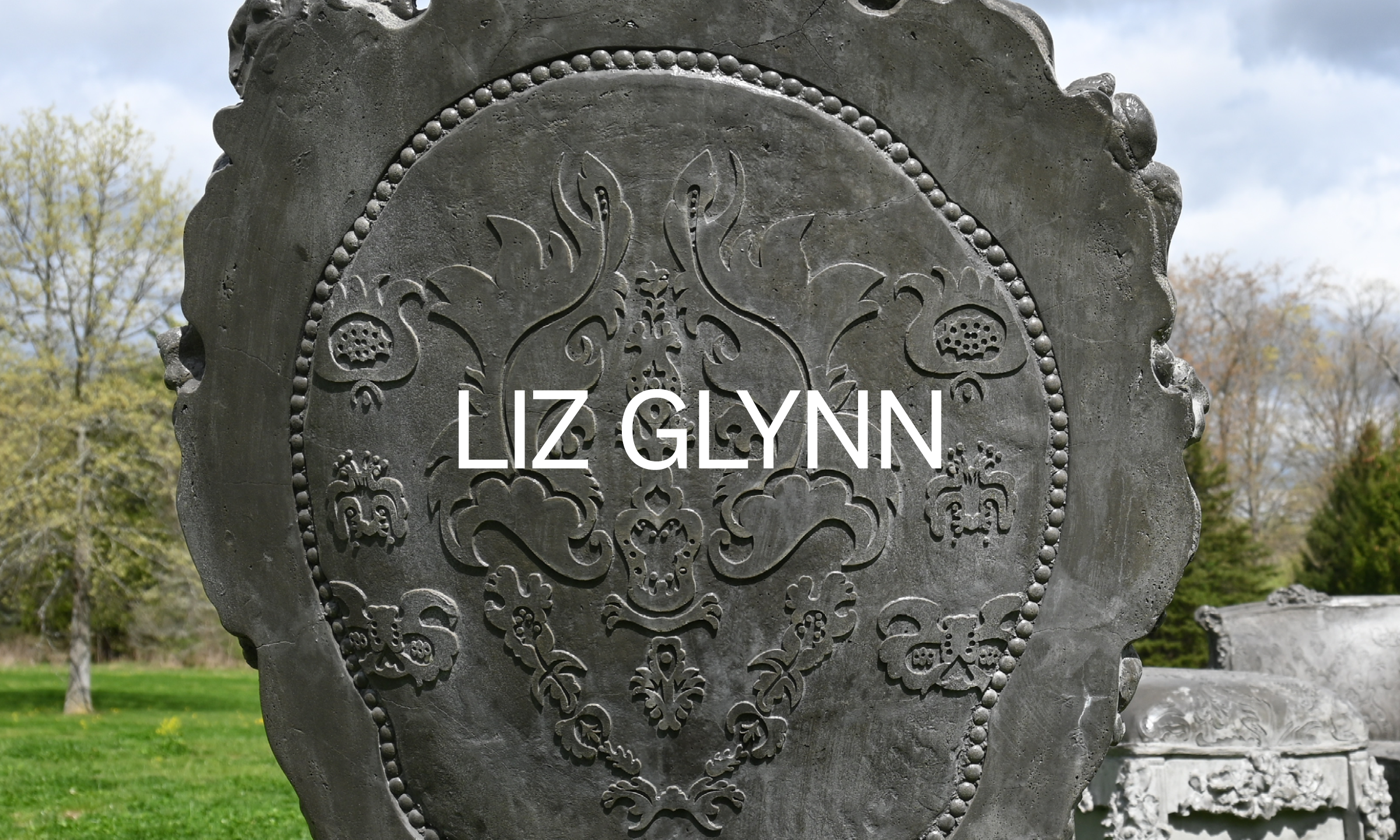 A close up detail of the print on a concrete chair.